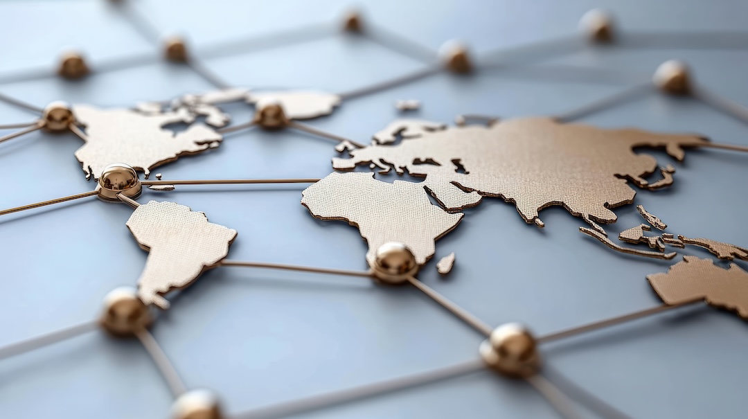 image showcases world map connected by network of lines and nodes, symbolizing global